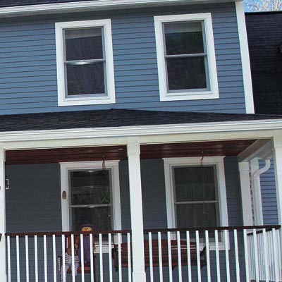 remodeled colonial revival house with curb appeal and new windows