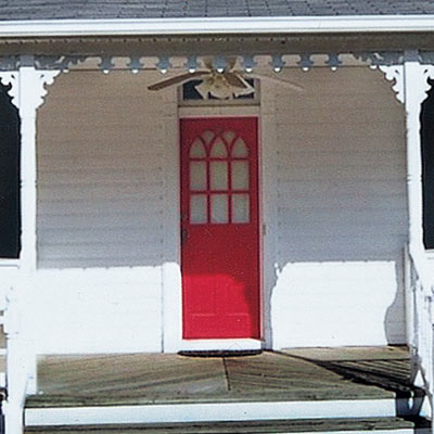 remodeled farmhouse with curb appeal and new door

