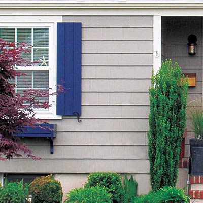remodeled cape cod house with curb appeal and new siding
