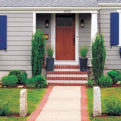 remodeled cape cod house with curb appeal and welcoming entry
