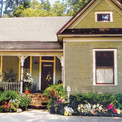 remodeled folk victorian house with curb appeal
