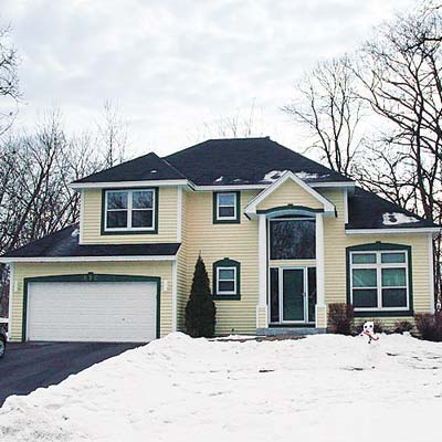 two-story portico with little curb appeal
