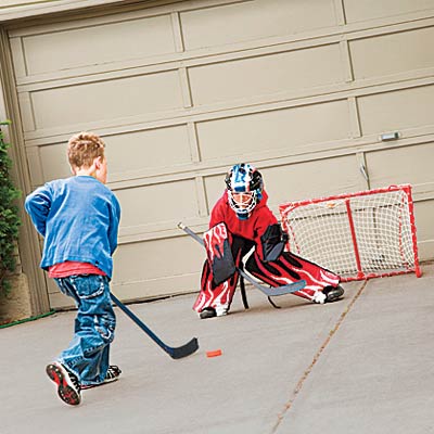 kids playing in front of garage