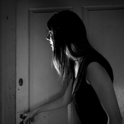 Girl opening door