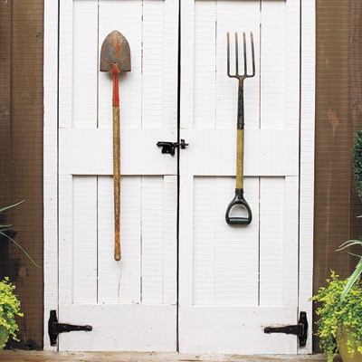 Decorative tools on outdoor shed door