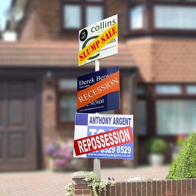 house with multiple repossession, foreclosure and short sale signs
