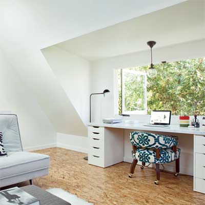 desk built into area zoned under a dormer of this refinished attic 