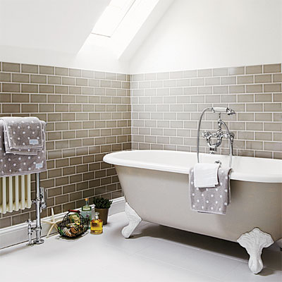 claw-foot tub installed in this refinished attic 