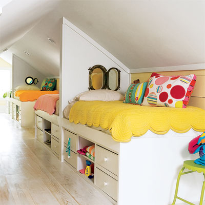 twin beds placed head to head in this refinished attic 