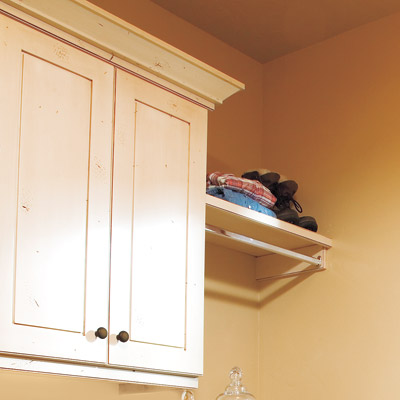 laundry room with cabinetry