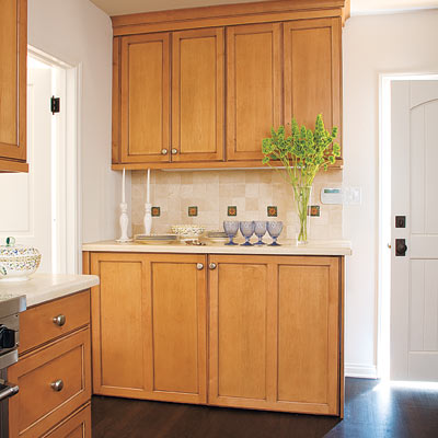laundry room hidden in kitchen sideboard