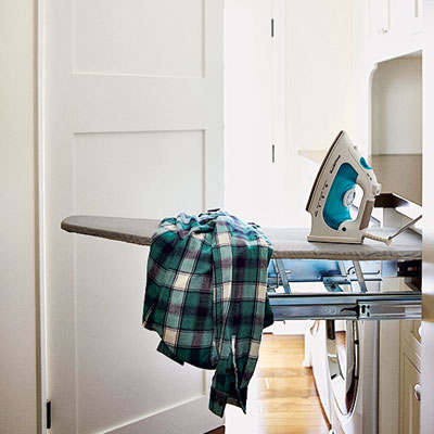 mudroom laundry room with retractable ironing board