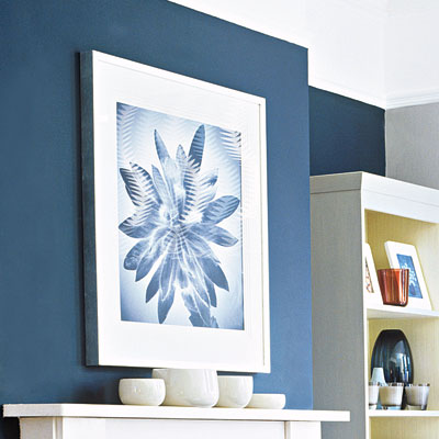 deep and dramatic living room with navy wall
