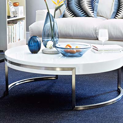 deep and dramatic living room with circular coffee table