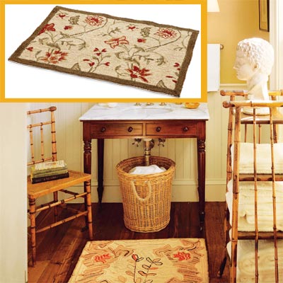 a half-bath furnished with Colonial details, hooked rug inset