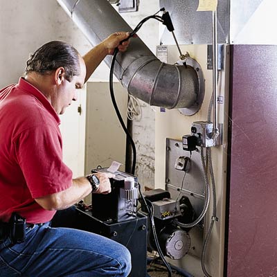 Richard Trethewey checks a furnace