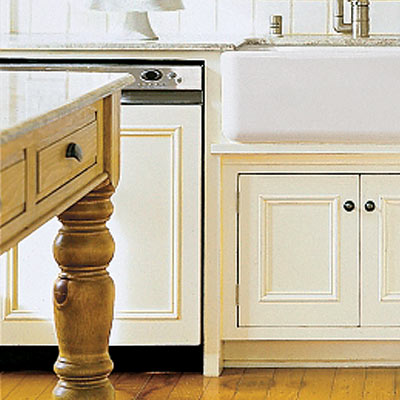 a dishwasher with a cover to match the wood cabinetry