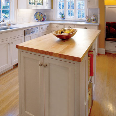 a Crate & Barrel kitchen island designed for storage