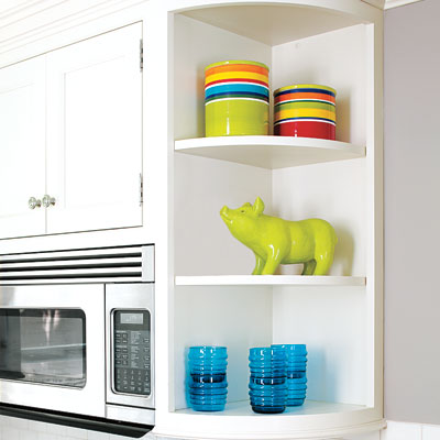 the open shelves in a small kitchen