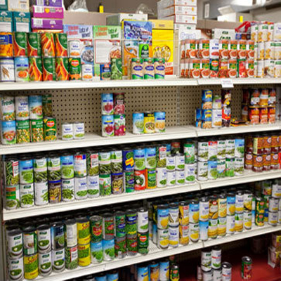 canned foods lining a store shelf; hurricane irene; storm prep