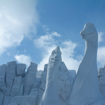 dinosaur snow carving