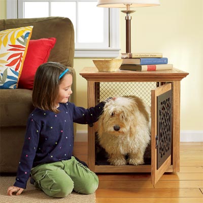 girl with dog in front a training crate you can build as a pet-friendly project