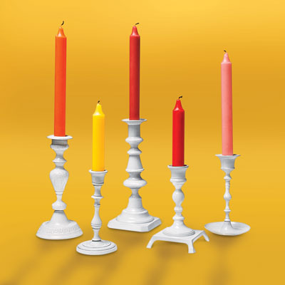 different style brass candlesticks after a spray paint makeover