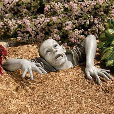 handmade zombie sculpture as one of the wackiest yard and garden products