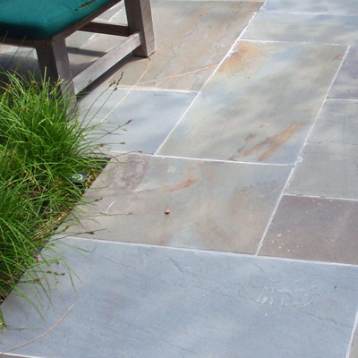 Replace plastic with stone patio blocks