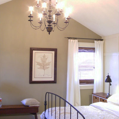 The Malinek's remodeled master bedroom with new paneled wall