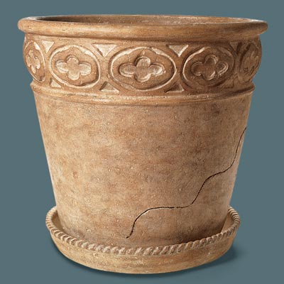faux stone urn with a cup and saucer design