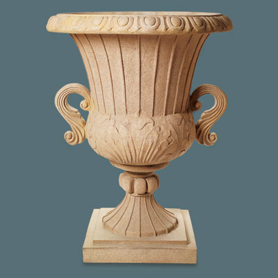 tall faux stone urn with a trophy design