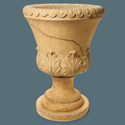 tall faux stone urn with a distressed finish