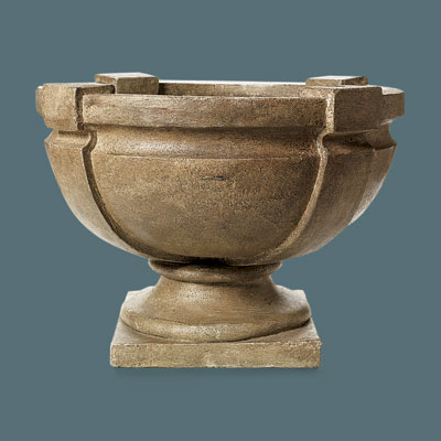 shallow faux stone urn with a strapped design