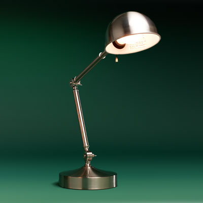 a steel with brushed-nickel finish pharmacy lamp
