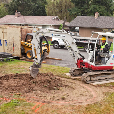 Excavating the basin of the selected garden area