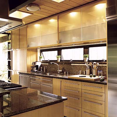 undercabinet and interior cabinet lighting combined with natural light in kitchen