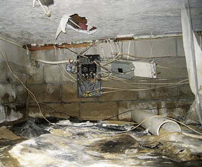 Basement crawl space with finished ceiling, ruined electrical, filled with dirt