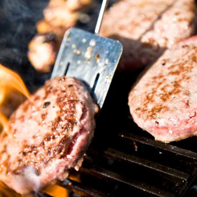 grilling light-colored meat on a gas grill