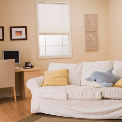 living room with couch with slipcover 