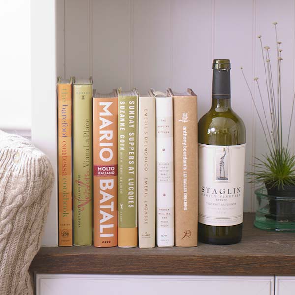 empty wine bottles used as book ends