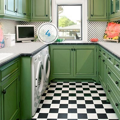 a laundry room with a flat-screen TV monitor 