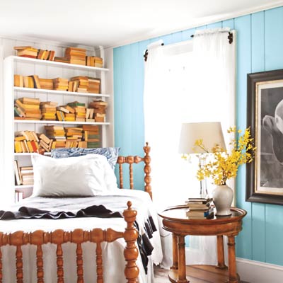bedroom with a blue wall