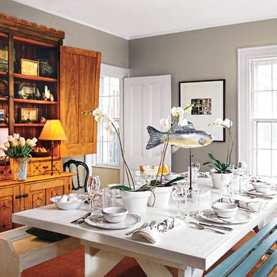 dining room with a gray wall