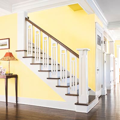 entry of a house with yellow walls