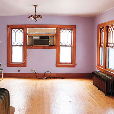 living room with mauve walls and golden Oak trim