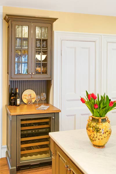 hutch used as wet bar in kitchen