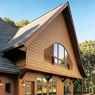 warm brown shingle finish giving the look of wood to  fiber cement siding