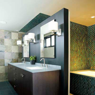 bath with green walls, floor tiles