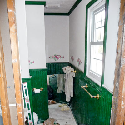 narrow small bathroom before remodel